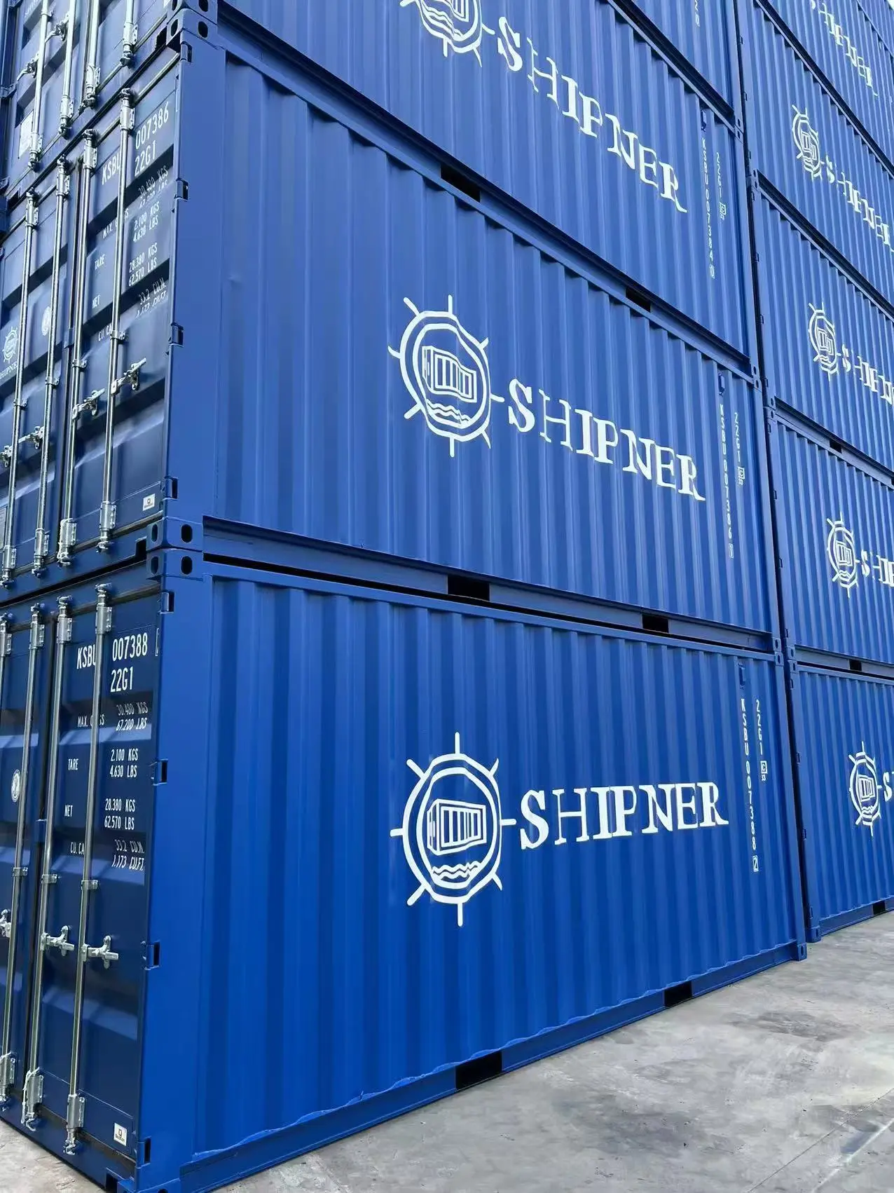 Stacked navy Shipner branded shipping containers